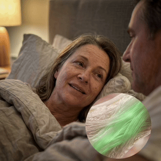Couple in a tasteful bedroom scene
